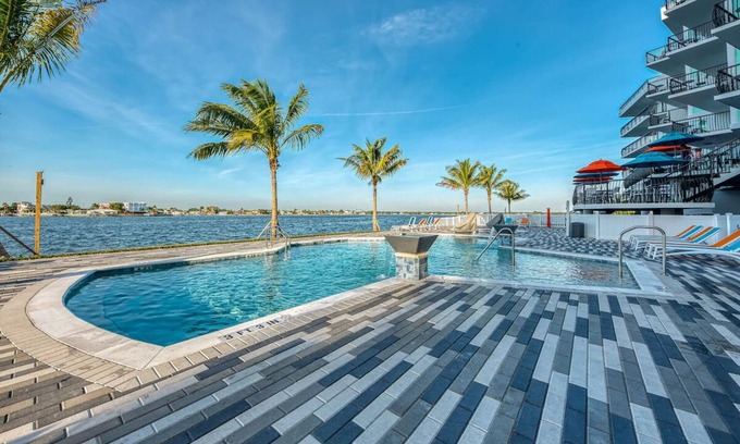 Treasure Island Hotel | Relaxing Beachfront Suite with Sunset Views | Pool, Full Kitchen & Balcony!