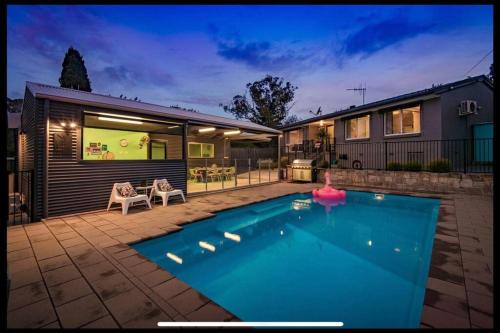 Hughes House | Resort style home pool spa sauna