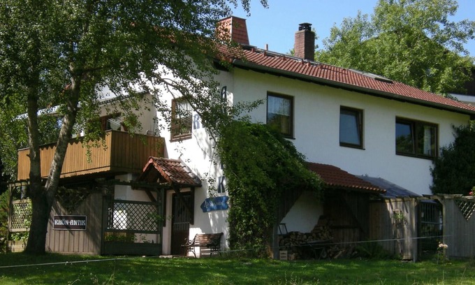 Dipperz Apartment | RHÖN-ANTIK" apartment with wood-burning stove and terrace for barbecuing.