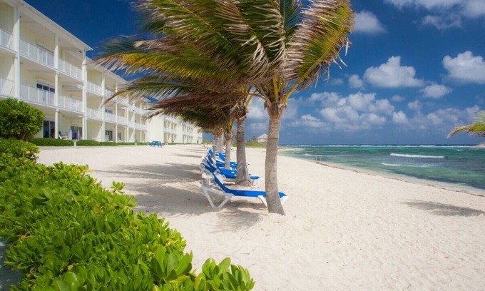 Colliers Bay Condo | Right on the Beach! Ground Floor 2BD/2BA Condo at Castaways Cove in the East End