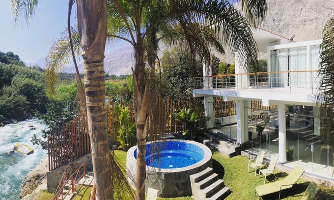 Lunahuana House | Riverfront house with private pool and garden