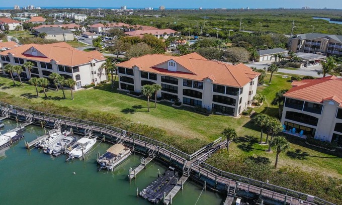 Bouchelles Island Apartment | Riverfront views Watch the dolphin play in this Riverfront Bouchelle Condo ~ 462 Bouchelle 202