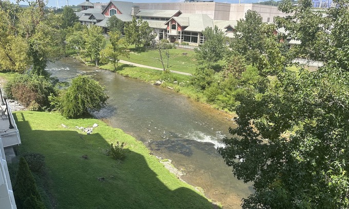 Pigeon Forge Condo | Riverside condo downtown Pigeon Forge, short walk to LeConte and The Island.