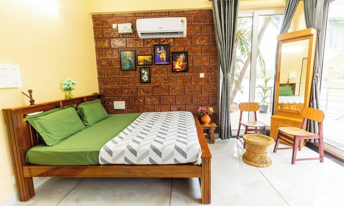 Tonse West Apartment | Riverside Retreat HomeStay – AC Studio with Breakfast Option & Boat Ride