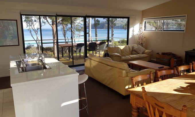 Surveyors Bay House | Roaring Beach Retreat - pet friendly, beachfront
