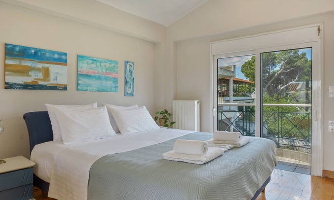 Spata-Artemida Apartment | Room 'First Floor Master Bedroom' with Shared Terrace, Wi-Fi, and Air Conditioning