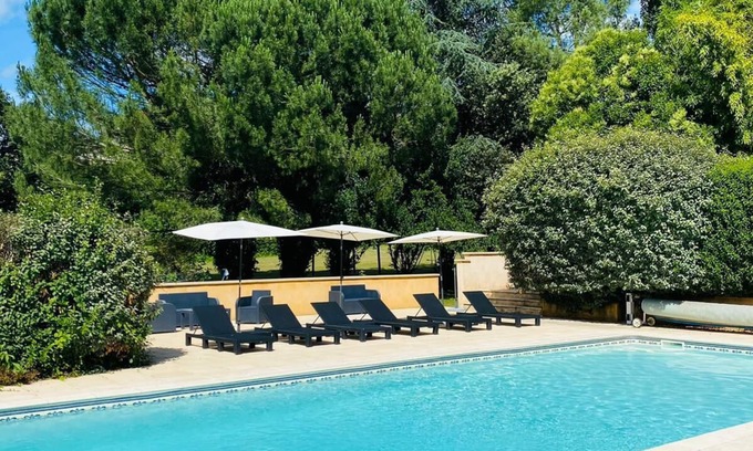 Berbiguieres House | Rose gite at Laugerie Basse Gites, with a beautiful heated pool and grounds