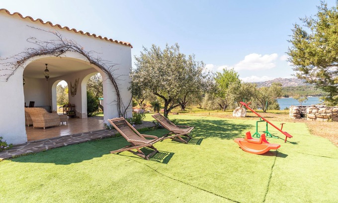 Cala Liberotto Villa | Rustic Villa, Air Conditioning and Beautiful Garden