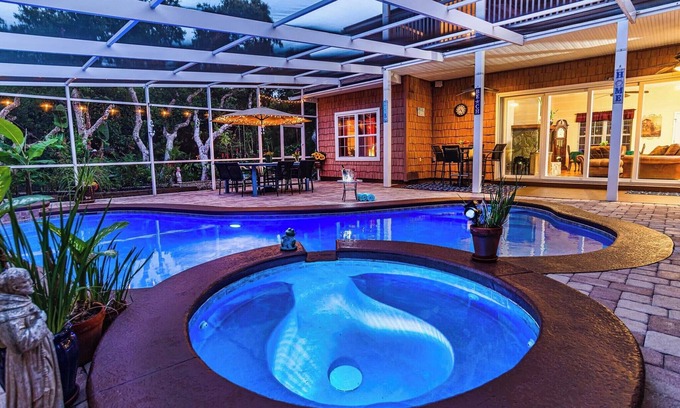 Vilano Beach House | Salt water pool - jacuzzi - BBQ - walk to beach - large screened lanai