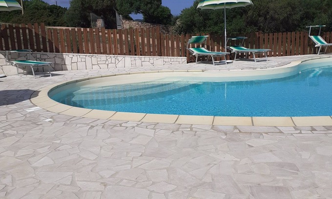 Aglientu Apartment | Sea breeze apartment with swimming pool and sea view, air conditioning,