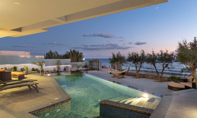 Koutsouras Condo | Sea-front suite in luxury contemporary villa with infinity pool & gorgeous views