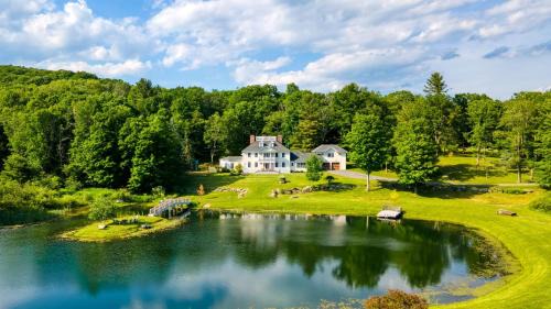 Austerlitz House | Secluded Berkshires Estate Private PondPoolTheater Gym Sunny Pond