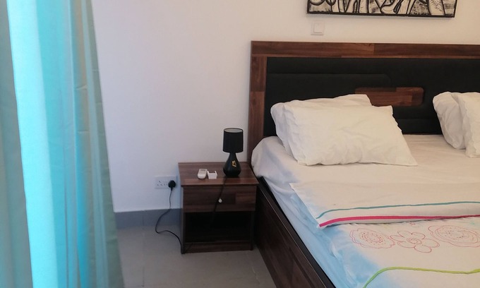 Epetu Apartment | Serene 2-Bedroom apartment on Golf Course with Lake Views & Luxury Amenities