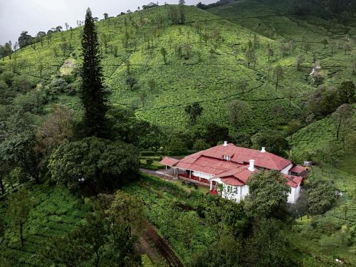 Valparai Hotel | Sereniva Orange Grove Bungalow