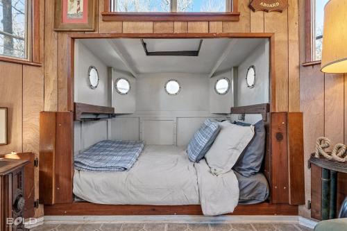 Uncertain House | Shipwreck With Upper Deck & Kayaks & Canoes