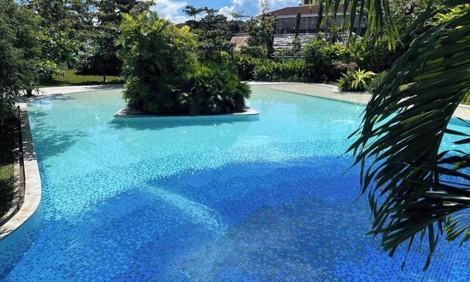 Maribago Condo | Side-by-side Luxury at Tambuli Resort for families. Wifi, Pool, Discount Passes