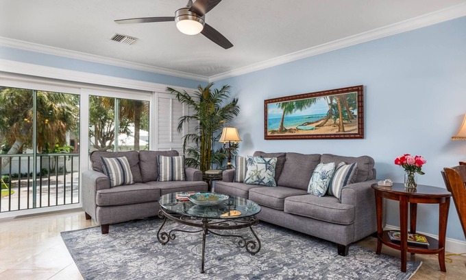 Saint Armands Key Condo | Simply Paradise! Updated Corner Unit Steps to Lido Beach & St. Armand's Circle, Pool, & Spa!