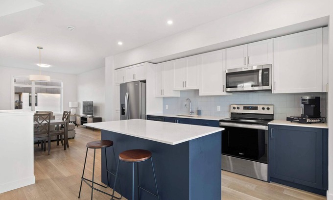 Calgary House | Skyline Retreat | Spacious 4BR Home with Balcony!