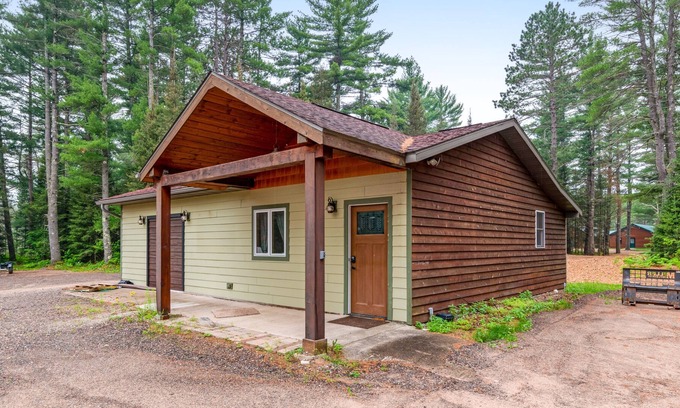 Conover Cabin | Snowmobiler's sanctuary with easy trail access, updated interior, & washer/dryer