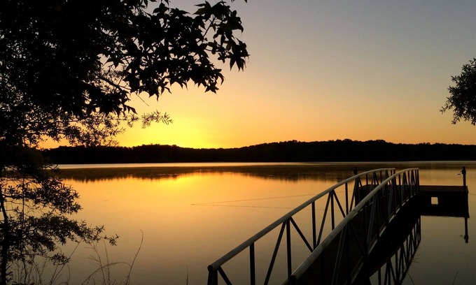 Clarksville Cottage | Solar powered cottage at lake, with dock, on private 300 acre timber preserve