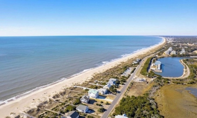 Caswell Beach House | Spacious 6-bedroom Oceanfront home! Pet Friendly! Sleeps 14!