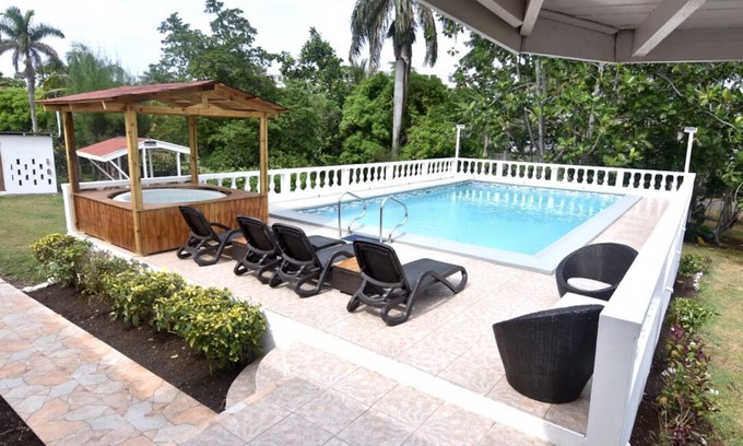 Mammee Bay Estates Apartment | Spacious contemporary Studio Apartment with swimming pool 5 mins walk from beach