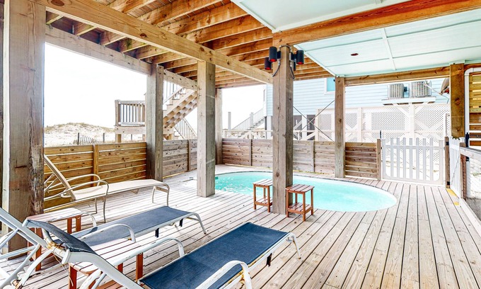 Fort Morgan House | Spacious, dog-friendly beachfront home with private pool, hot tub, grill, & deck