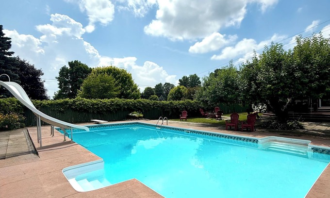Elizabethtown-Kitley House | Spacious Farmhouse Retreat - pet friendly, pool, deck, Orchard views, and more.