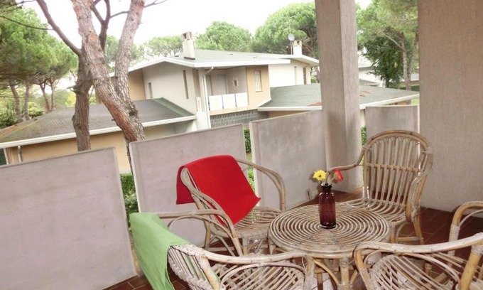 Bibione Apartment | Spacious flat with fenced garden and fireplace