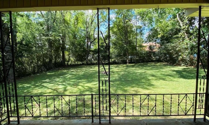Parsons House | Spacious home in downtown Parsons! Conference room, HS internet, & private yard