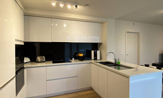 Brussels Apartment | Spacious, modern, comfortable residential apartment in a tower and cab rank near the center.