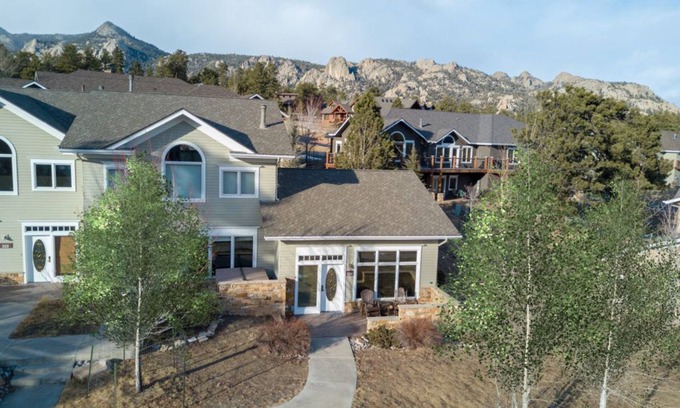 Stanley Hills Condo | Spectacular views of Lake Estes, private patio, hot tub, fireplace.