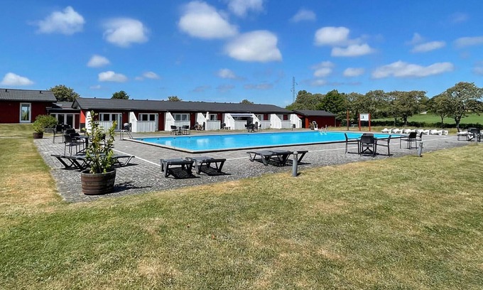 Akirkeby Apartment | Spend a relaxing vacation in this cozy apartment with shared pool.