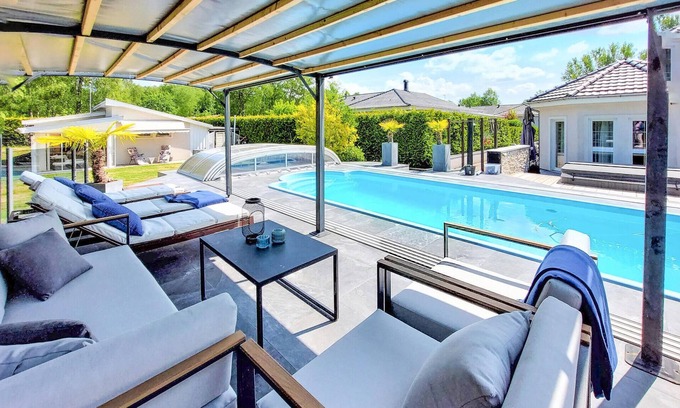 Billesholm House | Spend wonderful vacations in this vacation home with outdoor pool and jacuzzi