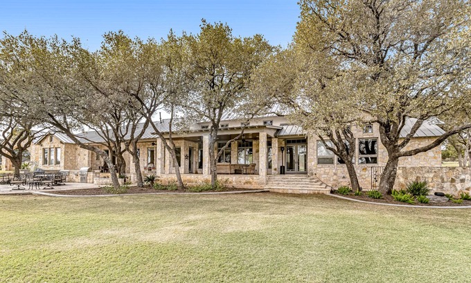Spicewood House | Sprawling, lakefront estate with a dock, game room, fast WiFi & gourmet kitchen
