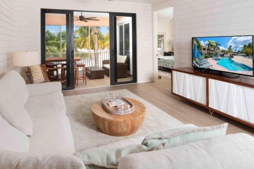 Rum Point Apartment | Starfish Kai - Serene Beachfront Condo with Stunning Bay Views & Resort Amenities