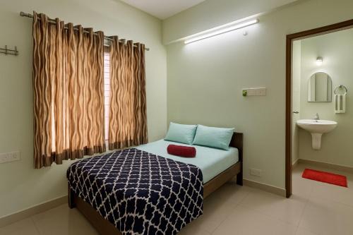 Arpookara Apartment | Stay Near Carithas & Matha Blue Bells by Haritha homes