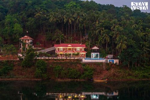 Quilandi Villa | StayVista at Lagoons Villa with Lawn, Pool, WiFi