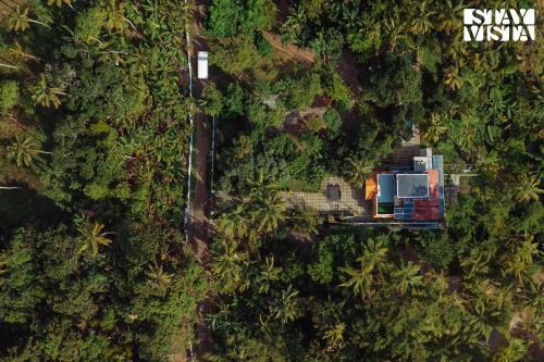 Thrissur Villa | StayVista at Nature Nook with Pvt Pool & Terrace Access