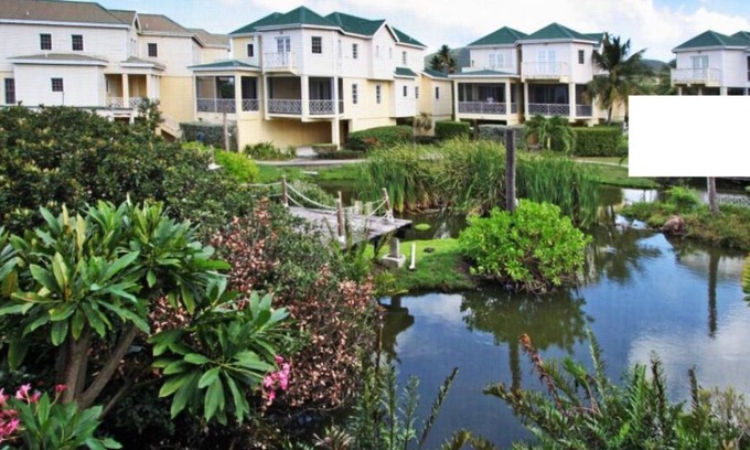 Charlestown Condo | Step from Condo or restaurant, onto the beach and into the pool 30 meter radius.