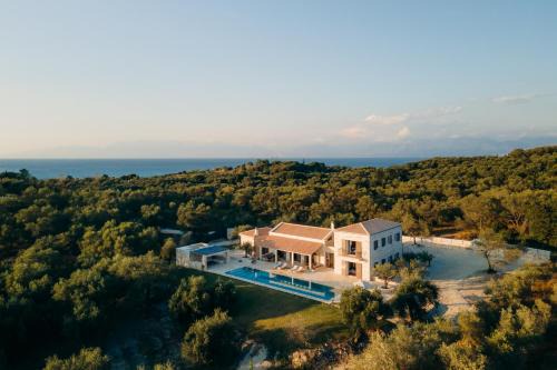 Roda Villa | Stone villa situated in the heart of an impressive estate, in one of the most scenic and secluded parts of Corfu’s northeast iconic Mediterranean coastline.