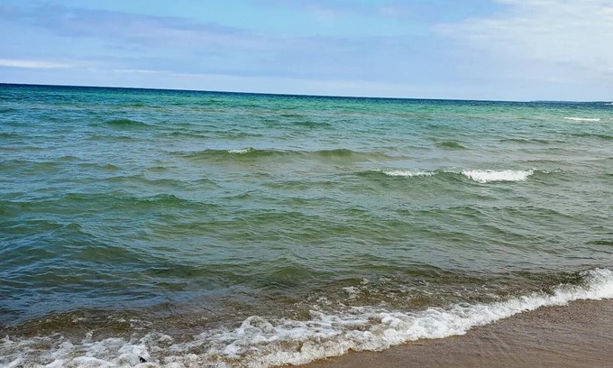 Millersburg House | Stroll down Merry Ln to the sandy bottom beach of your dreams LAKE HURON