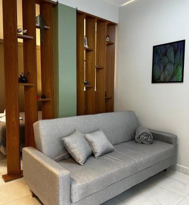 Regiao Urbana Homogenea X Apartment | Studio Aconchego Poços - Minimalista e bem localizado