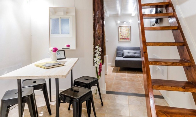 Barrio de La Latina Apartment | Studio with the bedroom in a high ceiling. Fully equipped with internet