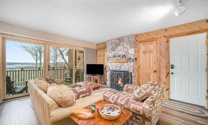 Bellaire Condo | Stunning Lake Bellaire Views! 2 Bedroom Condo in Summit Village