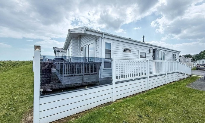 Hopton Cabin | Stunning lodge with full sea views and decking at Broadland Sands ref 20076CF