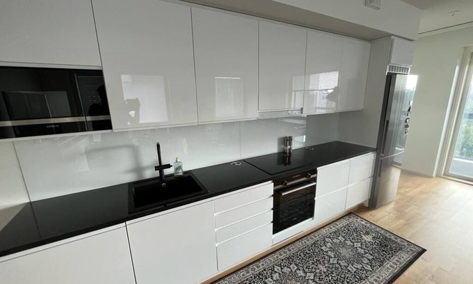Espoo Apartment | Stylish new apartment with indoor access to metro and shopping center.