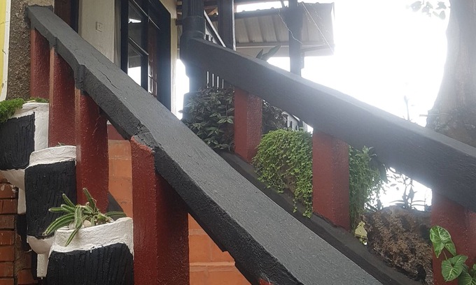 Kampala Apartment | Stylish three bedroom African-themed holiday home! Private baths and kitchen.