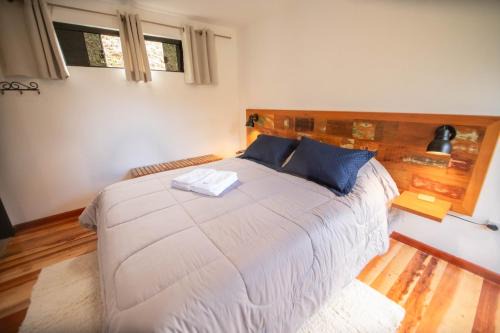 Recanto Araucaria House | Suíte jasmim vermelho