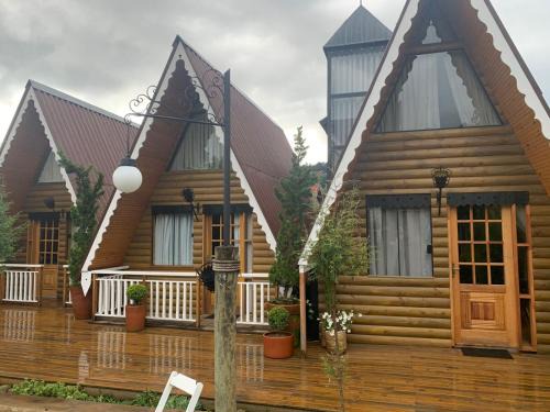Jardim Nova Suica Cabin | Suítes no Chalé - Cabanas